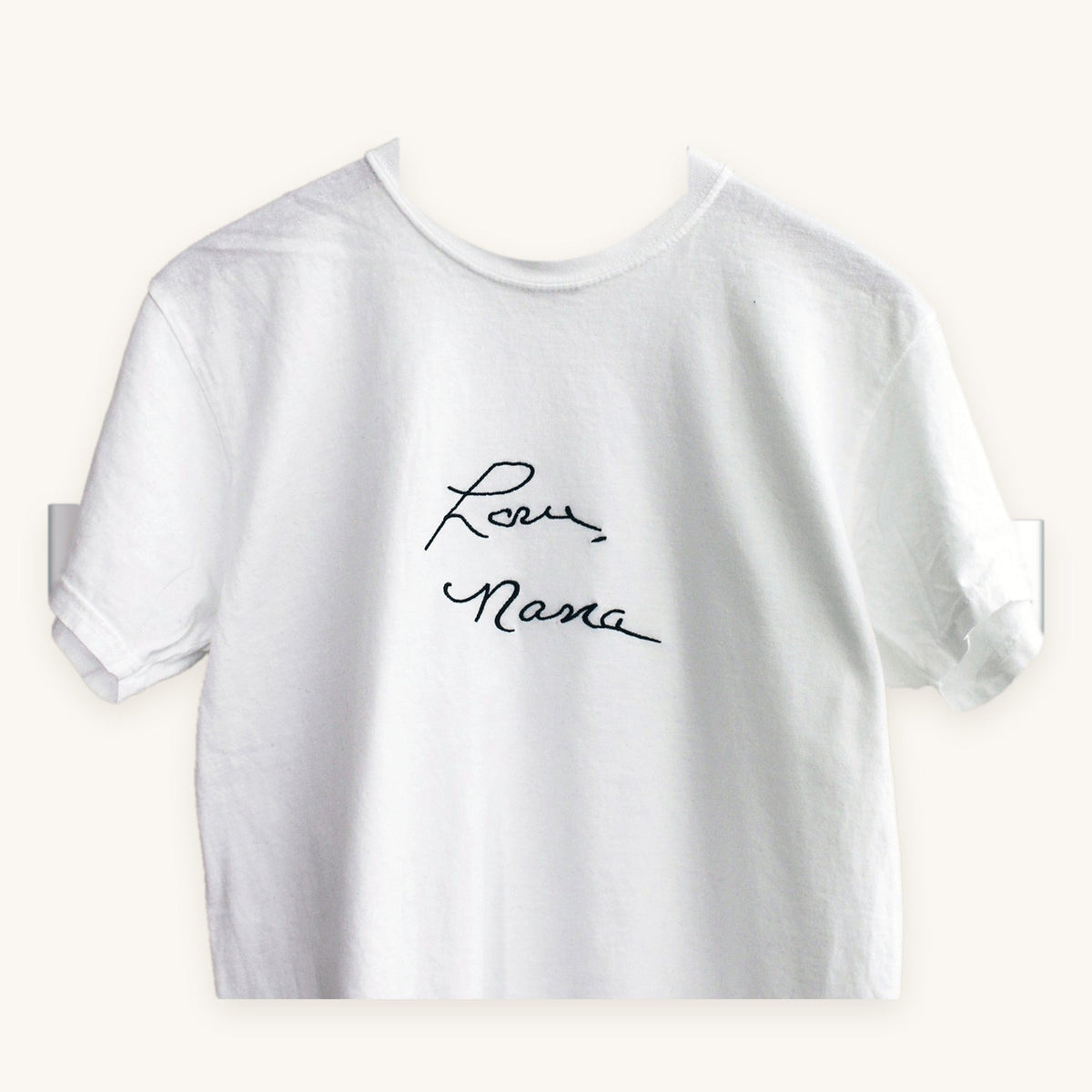 A loved one's handwriting embroidered on a white t-shirt